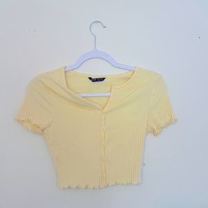 yellow cropped button up